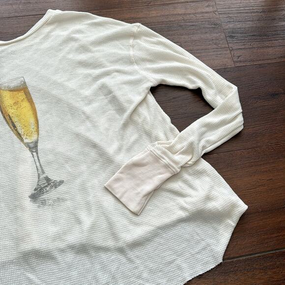 WildFox Pee Loved Long Sleeve Oversized Top with Champagne glasses graphic. - Picture 3 of 6